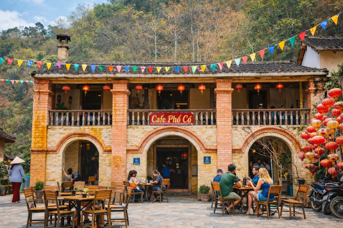 Dong Van Old Quarter in Ha Giang with historic stone buildings and outdoor cafés.